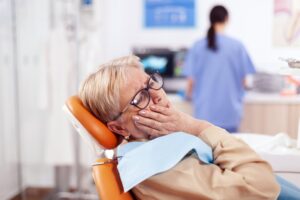 Woman at the dentist with a toothache